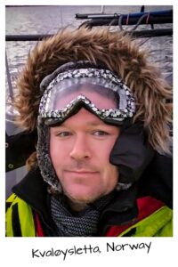 Christopher Ludgate boating in Arctic Sea, Norway.