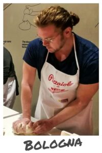 Christopher Ludgate making pizza in Bologna.