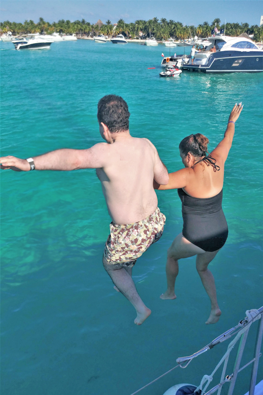 A leap of faith on adventure at Playa Norte, Riviera Maya with Lisa and Bill.