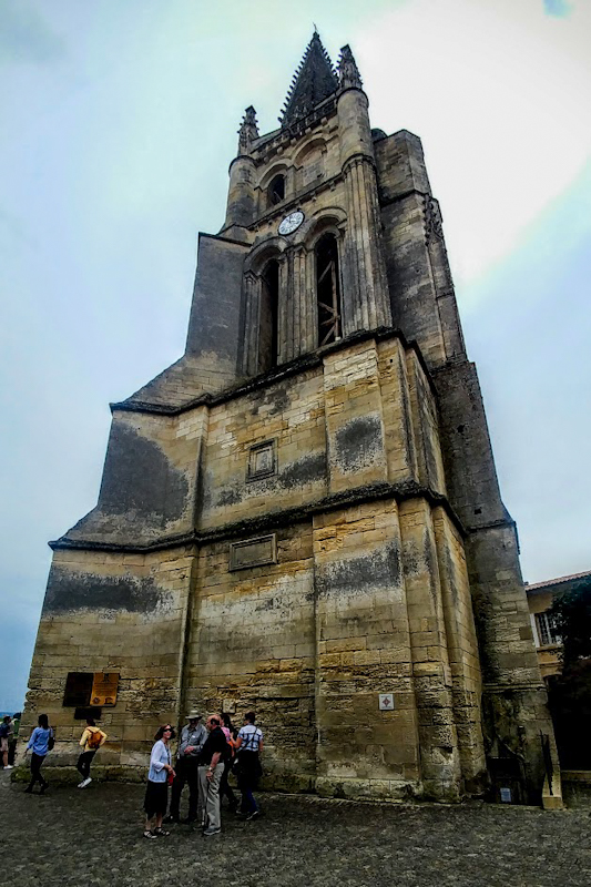 The Saint-Emilion clock tower looms above the mysterious cathedral and excavated gallery. The gorgeous texture and variegation of limestone are ubiquitous here.
