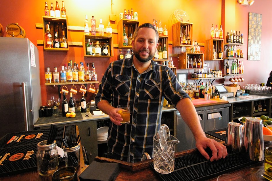 Sur-Lie mixologist, James, and his Poisedon’s Wrath drink.