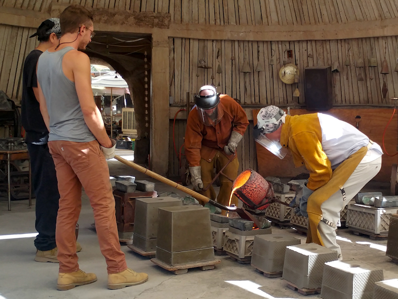 Craftsmen doing delicate work in Cosanti's foundry. Photo: Christopher Ludgate