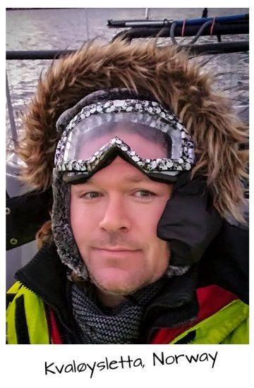 Christopher Ludgate boating in Arctic Sea, Norway.